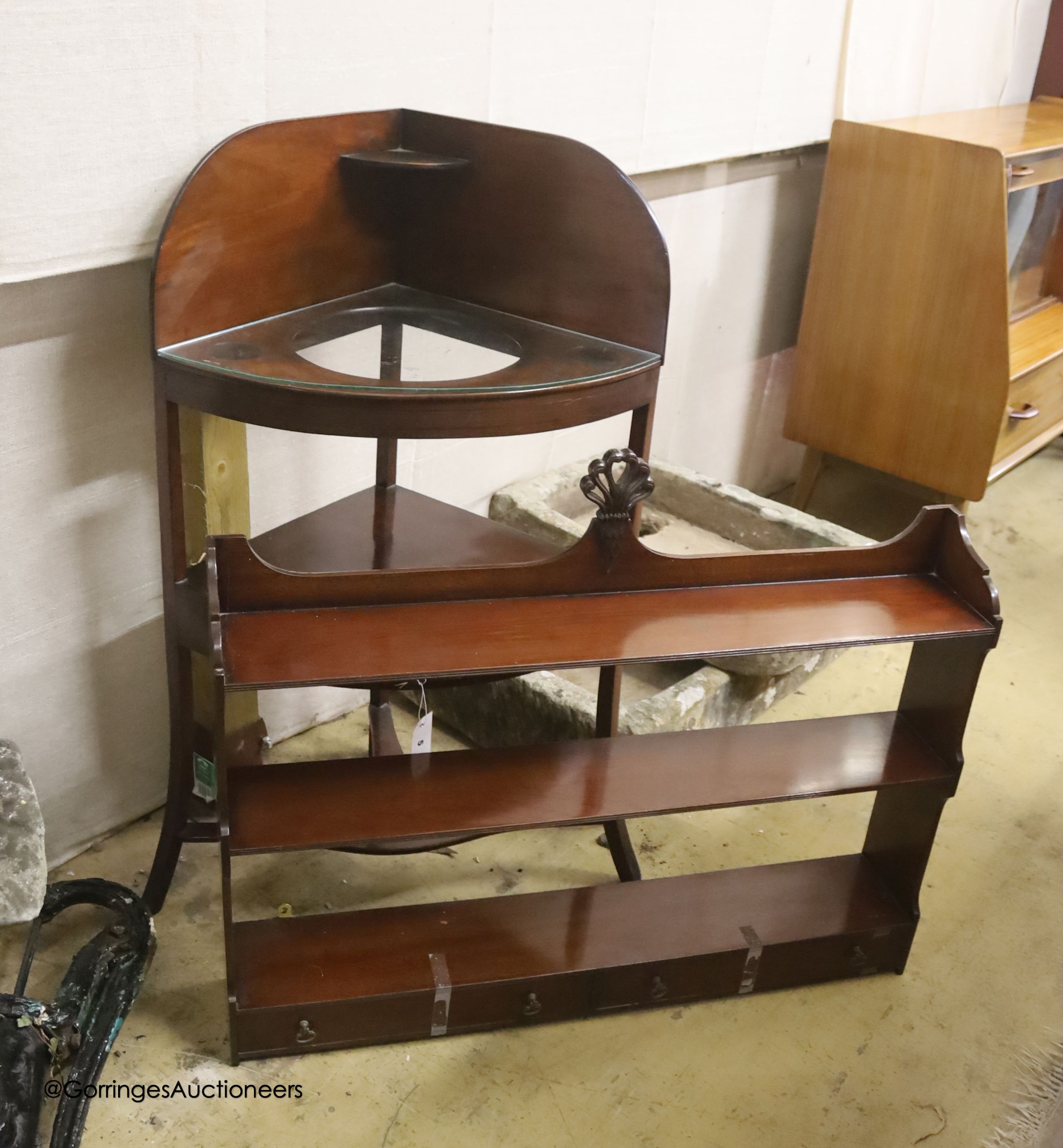 A George III mahogany two tier corner washstand, width 61cm, depth 42cm, height 106cm together with a reproduction mahogany three tier wall bracket